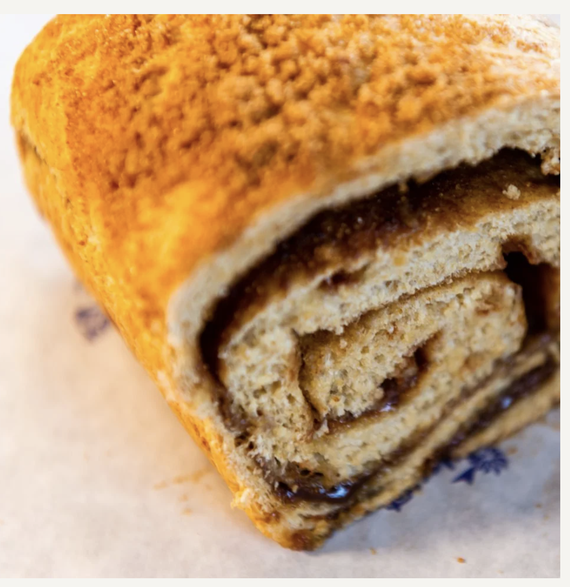 Extreme Cinnamon Swirl loaf sliced to show a bold cinnamon spiral
