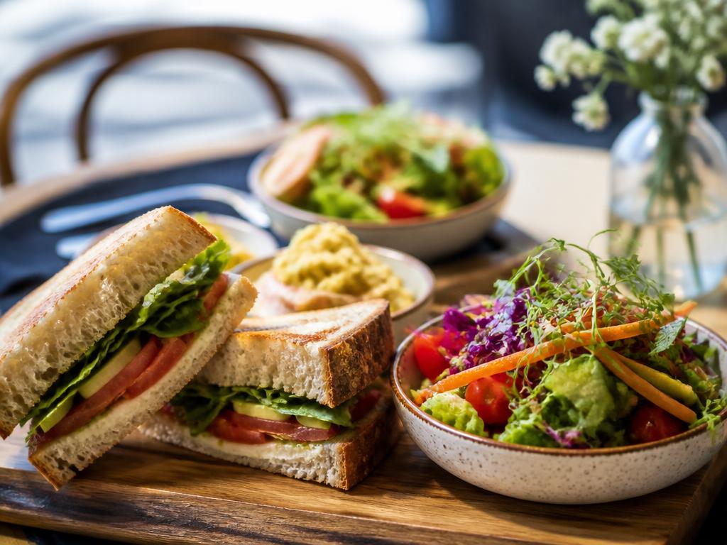 Sandwiches on fresh-baked bread arranged for a group lunch