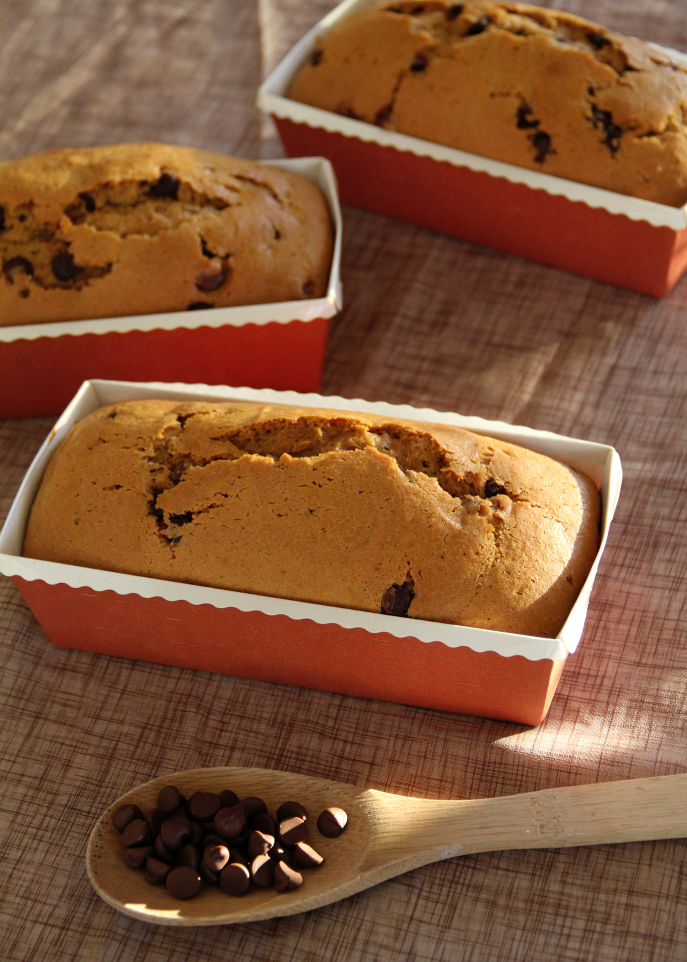 Sliced Pumpkin Chocolate Chip Teacake showing chocolate chips throughout